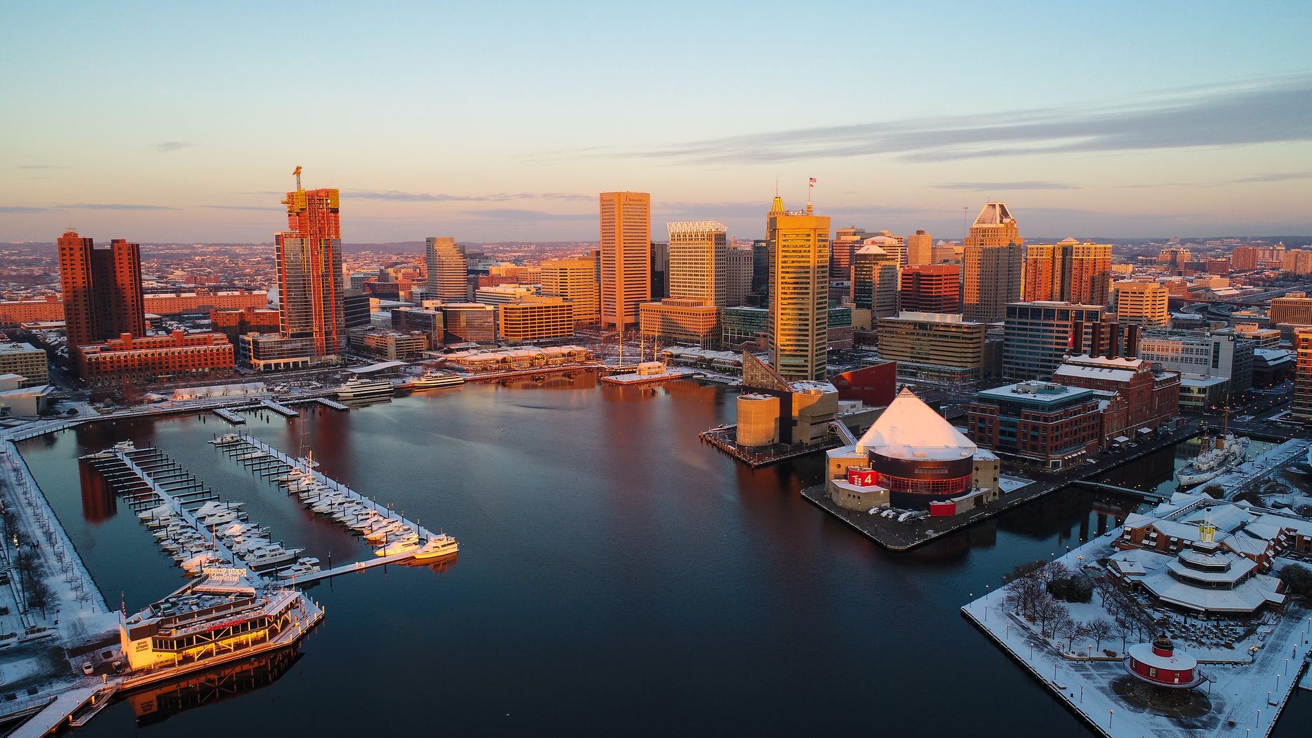 Aerial view of the Baltimore Inner Harbor at dusk